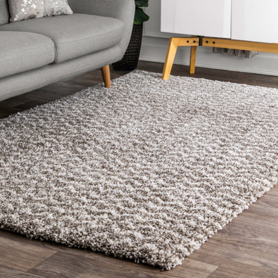 Tapis gris foncé à chevrons Sherer