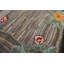 Tapis à motif floral abstrait gris
