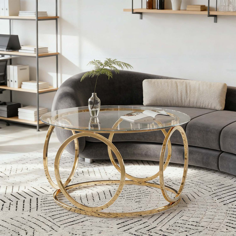 Table basse moderne Ã  plateau rond en verre et structure mÃ©tallique circulaire, Clear, Gold
