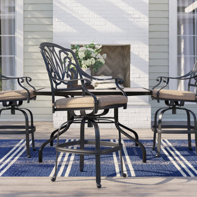 Lebanon Swivel 26" Patio Bar Stool with Cushion by Three Posts