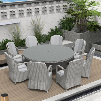Dusza 8 - Person Patio Dining Set with Round Table , Cushions Included