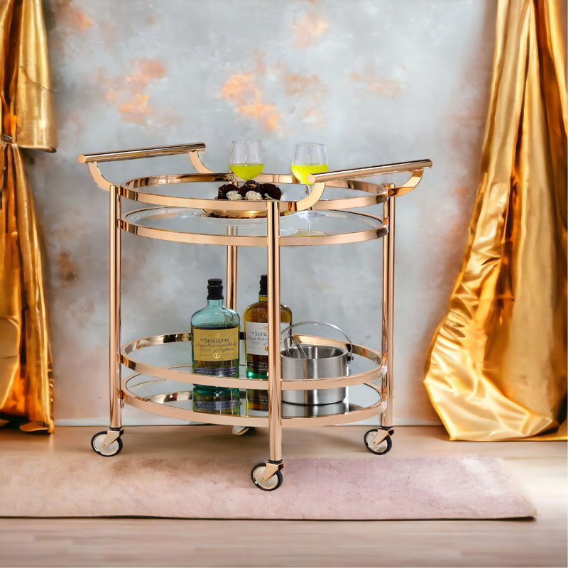 Chariot de service en verre transparent et finition or rose