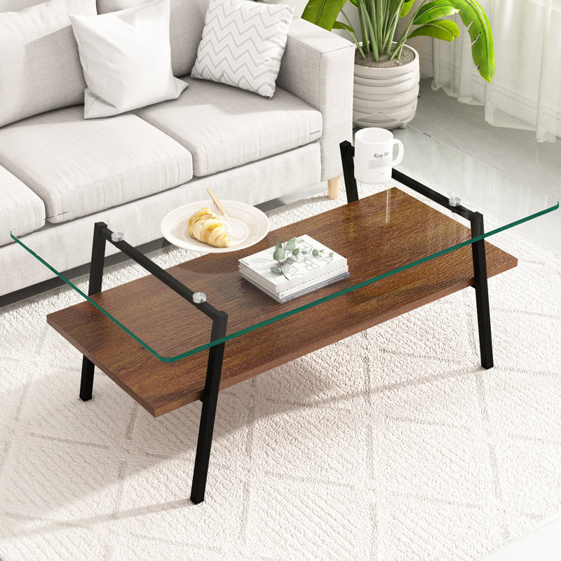 Table de salon rectangulaire avec plateau en verre transparent et construction stable