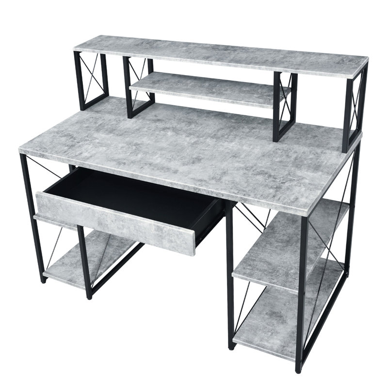 Bureau noir, un tiroir et huit compartiments ouverts, fini imitation béton, structure tubulaire en métal, idéal pour un bureau à domicile ou un bureau rectangulaire.