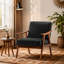 Chaise d'appoint Mid-Century moderne en similicuir noir - compacte et élégante pour tout espace de vie