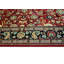 Tapis rouge pak-persan en particules