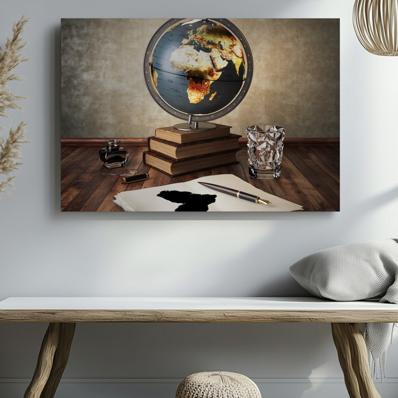 Toile, scène d'étude doucement éclairée avec art mural rétro en forme de globe illuminé mettant en vedette les Continents d'Afrique