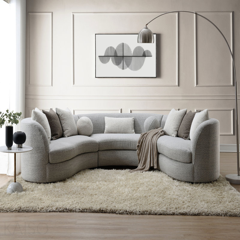 Canapé modulaire gris avec 9 coussins