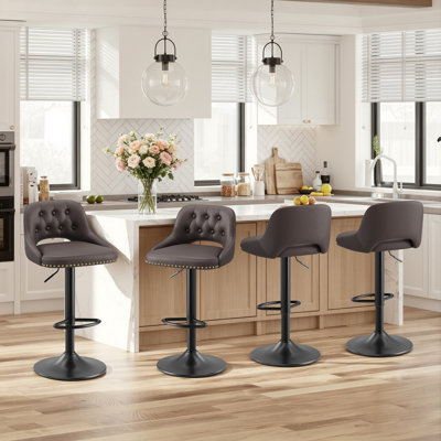 Tabourets de bar modernes à hauteur réglable avec structure en métal et garniture cloutée