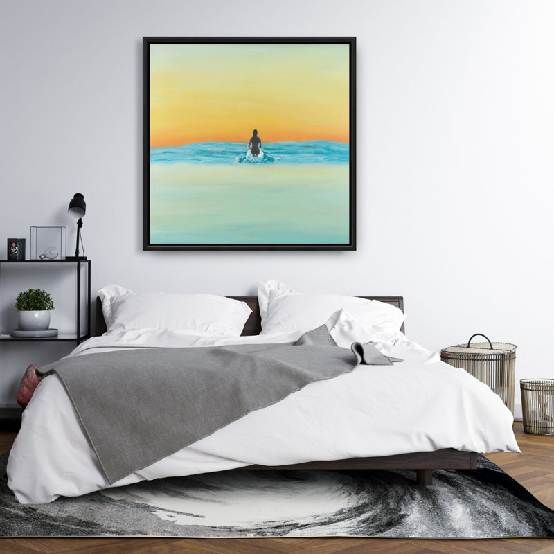 Un surfeur nageant par aube - décor de toile encadrée de mer