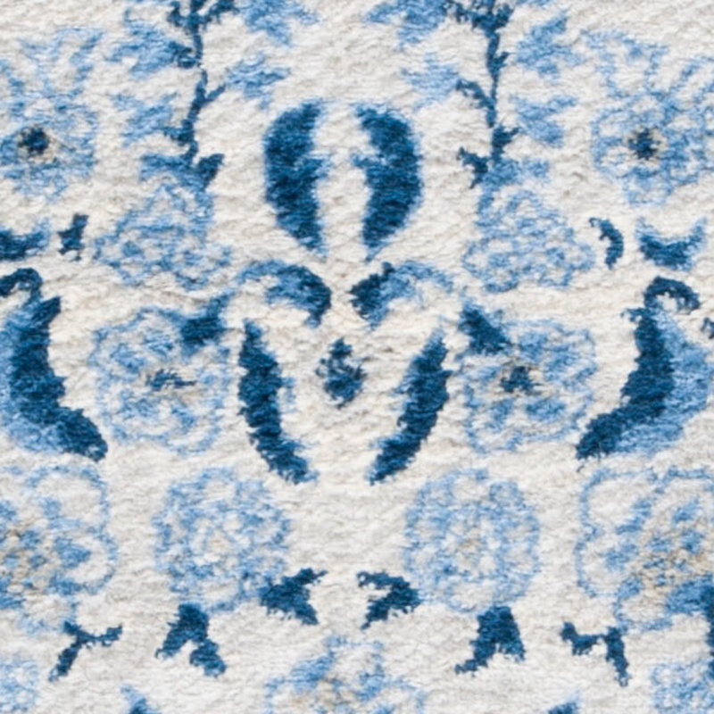 Blue and Cream Floral Synthetic 11' x 15' Area Rug