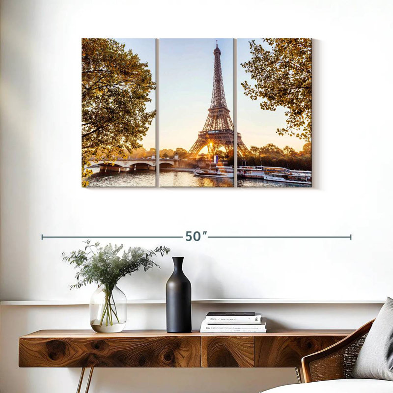 Le lever du soleil à la tour Eiffel, H 24 po x l 38 po