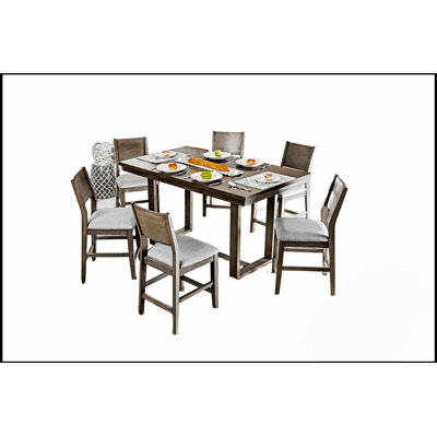Ensemble de table de salle à manger 7 pièces à hauteur de comptoir avec table grise et chaises rembourrées en tissu, parfait pour les espaces compacts et les maisons urbaines.