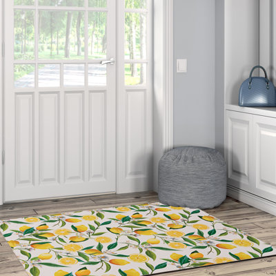 Tapis ivoire et jaune lavable à la machine Madai