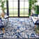 Ammundsen Floral Navy/Ivory Area Rug