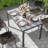 Raydell Rectangular Polyethylene (PE) Wicker Outdoor Dining Table