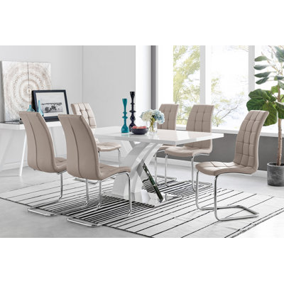 Ensemble de table de salle à manger Edzard en chrome et blanc ultrabrillant avec 6 chaises de luxe en similicuir