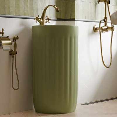Vintage‑green cylindrical freestanding integrated ceramic bathroom sink
