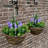 23cm Faux Flowering Topiary in Basket