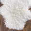 Tapis zone ivoire naturelle en peau mouton