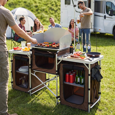 Camping Kitchen Table, Portable Folding Outdoor Cook Station with 3-Side Windscreen & Storage Cabinet, Aluminum BBQ Prep Table with Carry Bag for RV Travel, Picnic, Family Party
