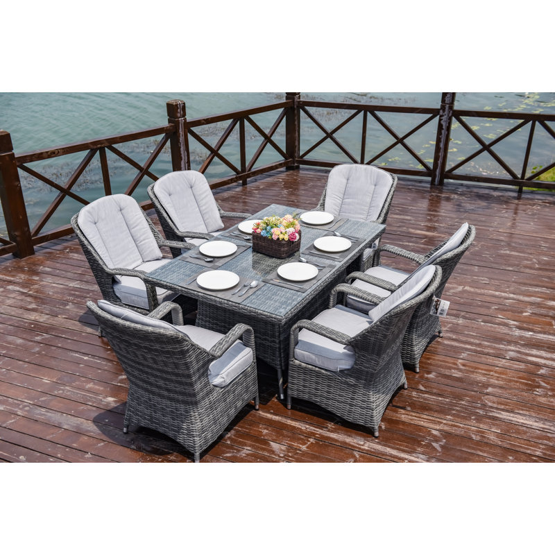 Algird 6 - Person Wicker Patio Dining Set with Rectangular Table , Cushions Included, Gray