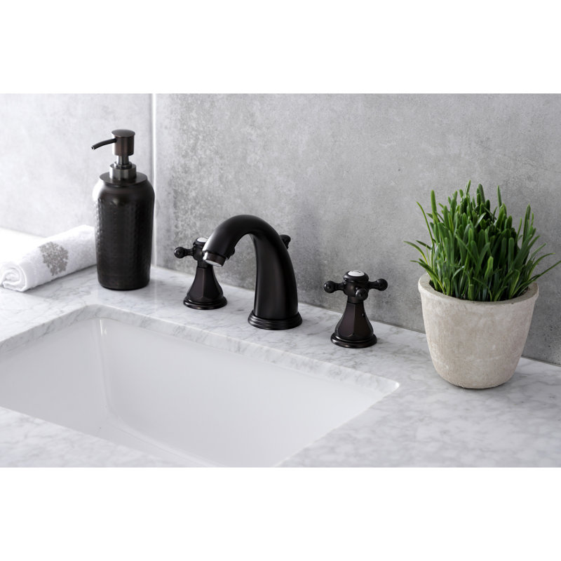 Kingston Brass Metropolitan Two-Handle 3-Hole Deck Mount Widespread Bathroom Faucet with Retail Pop-Up Drain