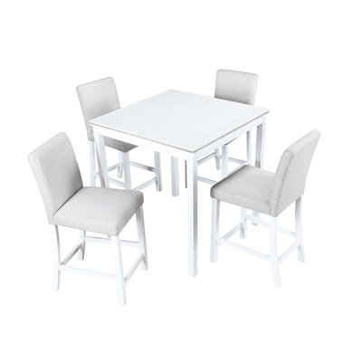 Table de salle à manger haute avec 4 chaises rembourrées blanches. Ornements carrés en cristal. Structure et bois massif. Finition élégante de 5 pouces. Fabriqué en