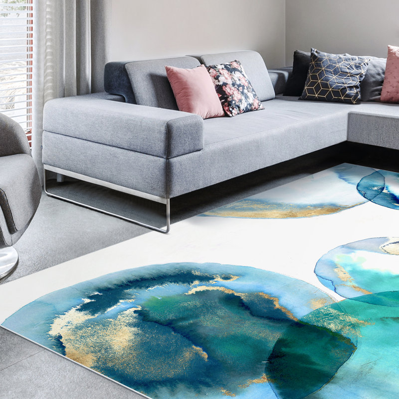Tapis rectangulaire Divyan avec envers antidérapant