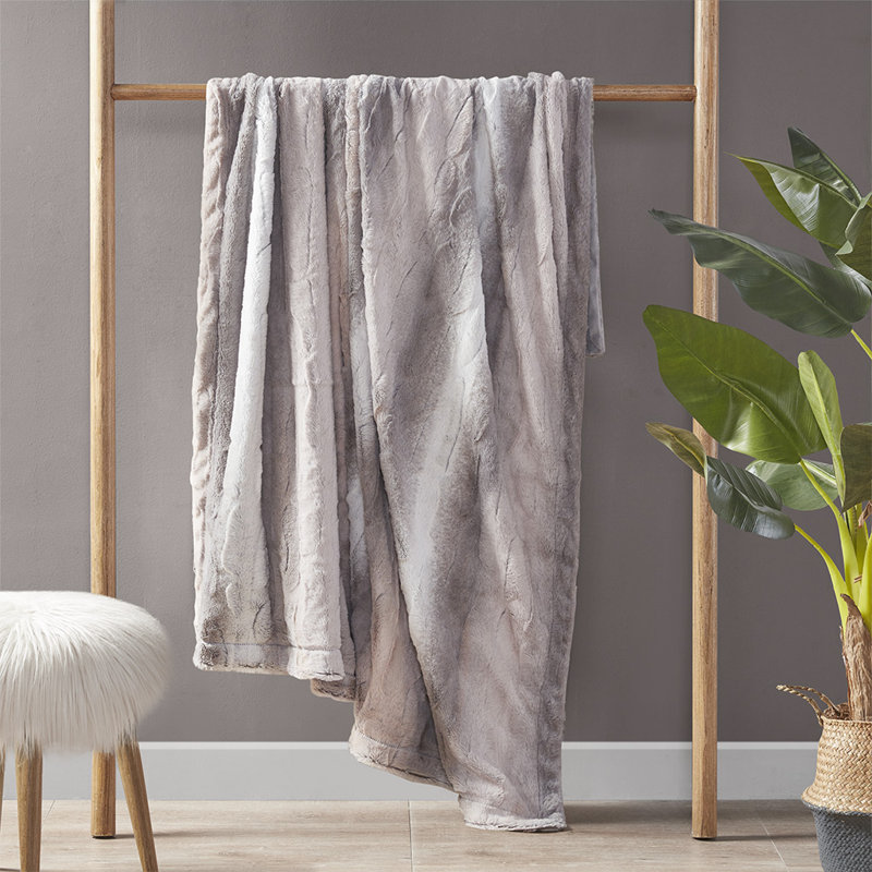 Jeté en fausse fourrure luxueusement doux, Gris