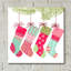  «Stockings» par Art Licensing Studio, art mural en verre acrylique, 12 po x 12 po