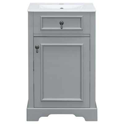 Meuble-lavabo de 20 pouces avec lavabo en céramique, porte à fermeture douce, tablette réglable et support de rangement fixé à la porte