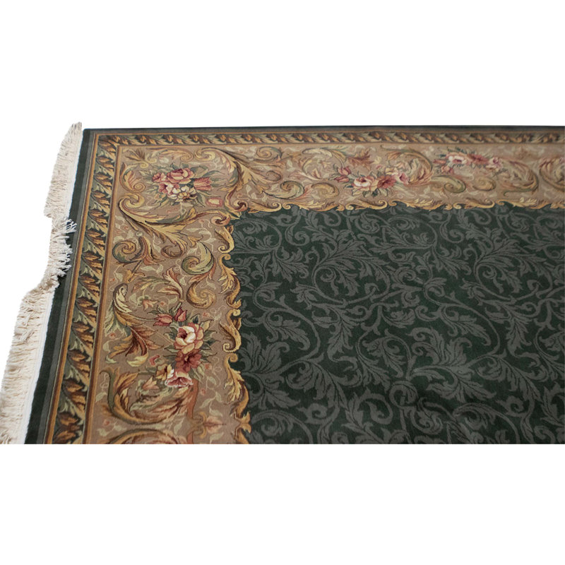 Hand Knotted Wool Oriental Area Rug in Green And Cream