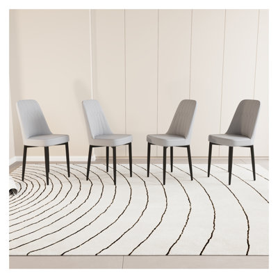 Set of 4 Modern Dining Chairs - PU Leather Upholstered Kitchen Chairs with Ergonomic Design and Black Metal Legs, Grey Mid-Century Dining Room Chairs for Kitchen, Dining Room & Living Space