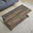 Clayman Faux Wood Rectangular Coffee Table-107541578