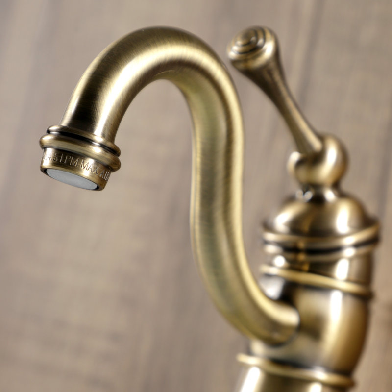 Kingston Brass Victorian Single-Handle 1-Hole Deck Mount Bathroom Faucet with Plastic Pop-Up, Vintage Brass