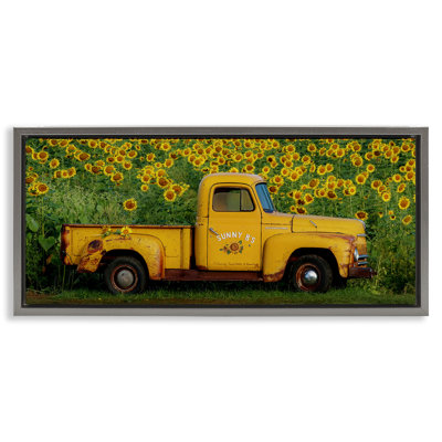 Yellow Pickup in Sunflower Field