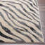 Tapis taupe / gris clair à imprimé animalier Edsel-1761034879