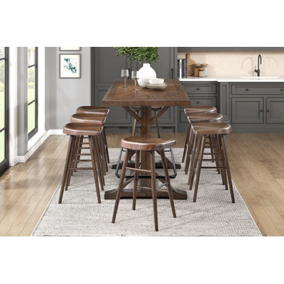 9-Piece Pub Height Dining Set, 78 x 32 x 42 Inch Table, 17.5 x 15 x 29.5 Inch Stool, Acacia Veneer, Wood and Metal, 9 Piece (1 Table and 8 Stools), Brown, Black Metal Footrest with Sculpted Saddle Stools