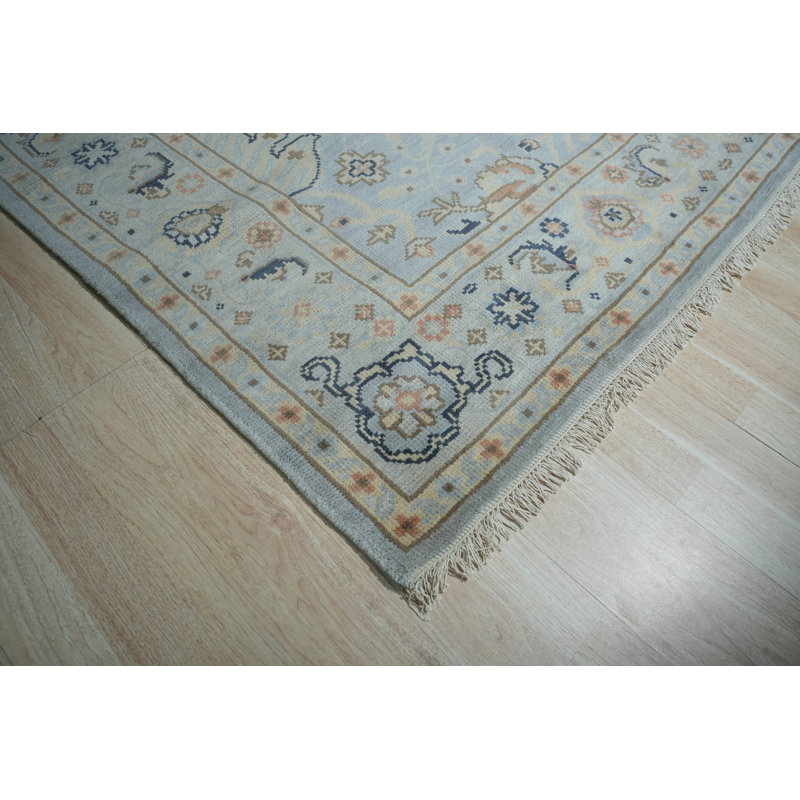 Tapis traditionnel en laine noué à la main bleu clair Makhyia