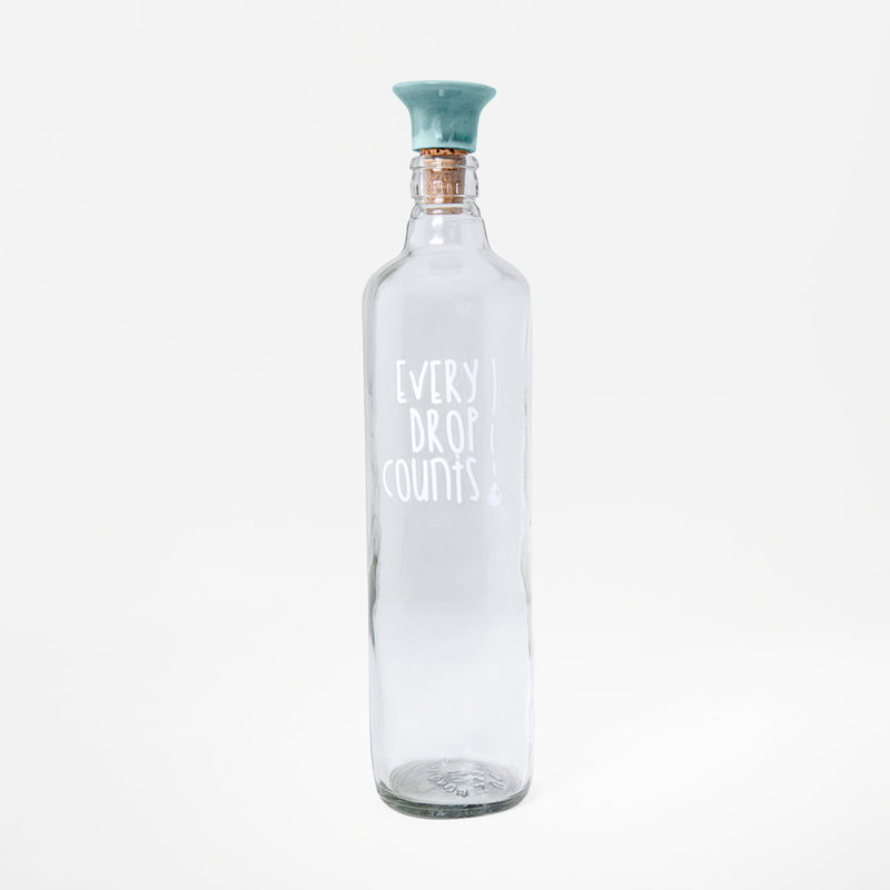 Bouteille d'eau en verre avec bouchon en céramique