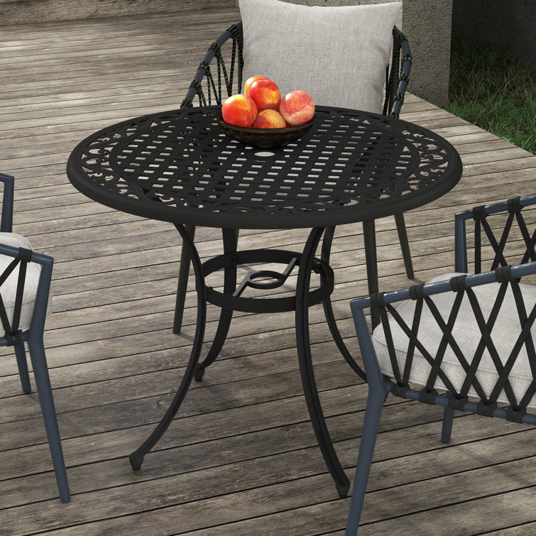 cast aluminium garden table and 4 chairs