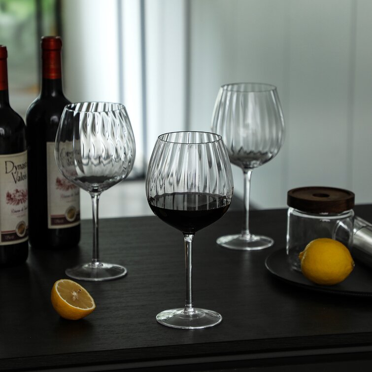 https://assets.wfcdn.com/im/33963012/resize-h755-w755%5Ecompr-r85/1656/165655694/Mikles+Ribbed+23+oz.+Red+Wine+Glass.jpg