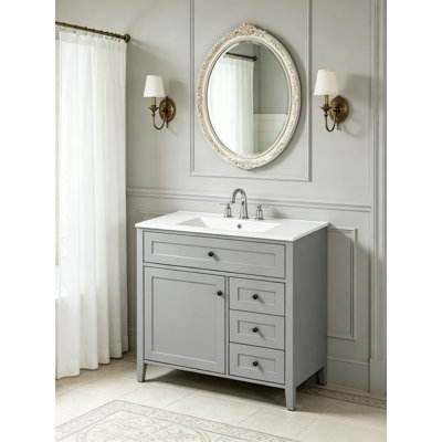 Meuble-lavabo sur pied 36 po avec lavabo en céramique et armoire de rangement avec tiroir 36 po