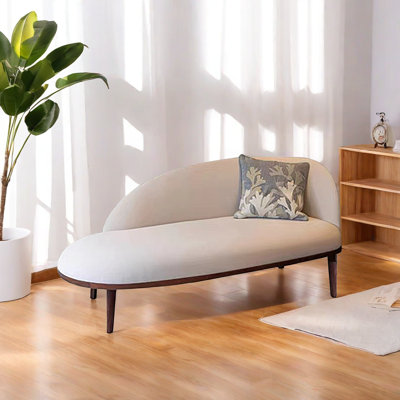 Chaise longue rembourrée en bois massif