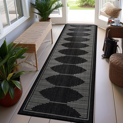 Tapis intérieur / extérieur noir / ivoire à motif géométrique facile à entretenir et tissé à plat