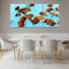 Ensemble de 3 tableaux sur toile tendue représentant des feuilles d'automne sur un ciel bleu-1998335014