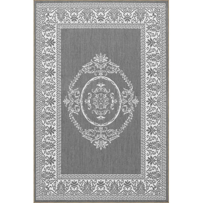 Tapis tissé rond lavable à motif traditionnel