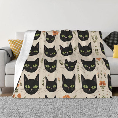 Couverture en laine à imprimé chat noir, idéale pour les voyages et les escapades. Chaude et confortable, elle convient autant à la maison qu'au bureau. Dimensions : 101,6 x 127 cm. Un sac en toile imprimé chat est offert.