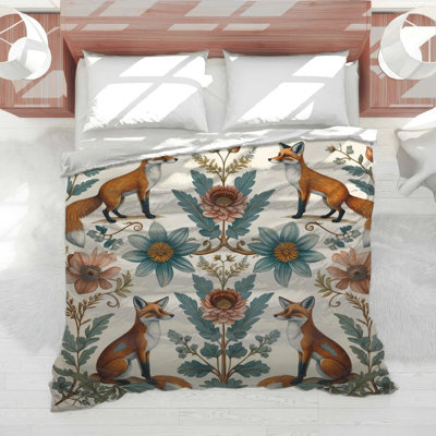 Édredon renards et motifs floraux